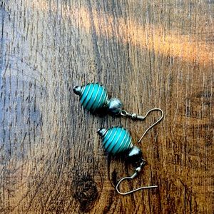 Dangling silver and turquoise earrings